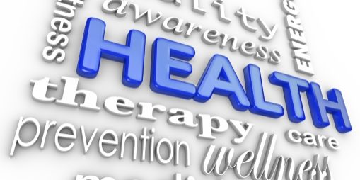The word Health surrounded by a collage of words related to healthcare such as fitness, therapy, prevention, medicine, vitality, awareness, care and energy